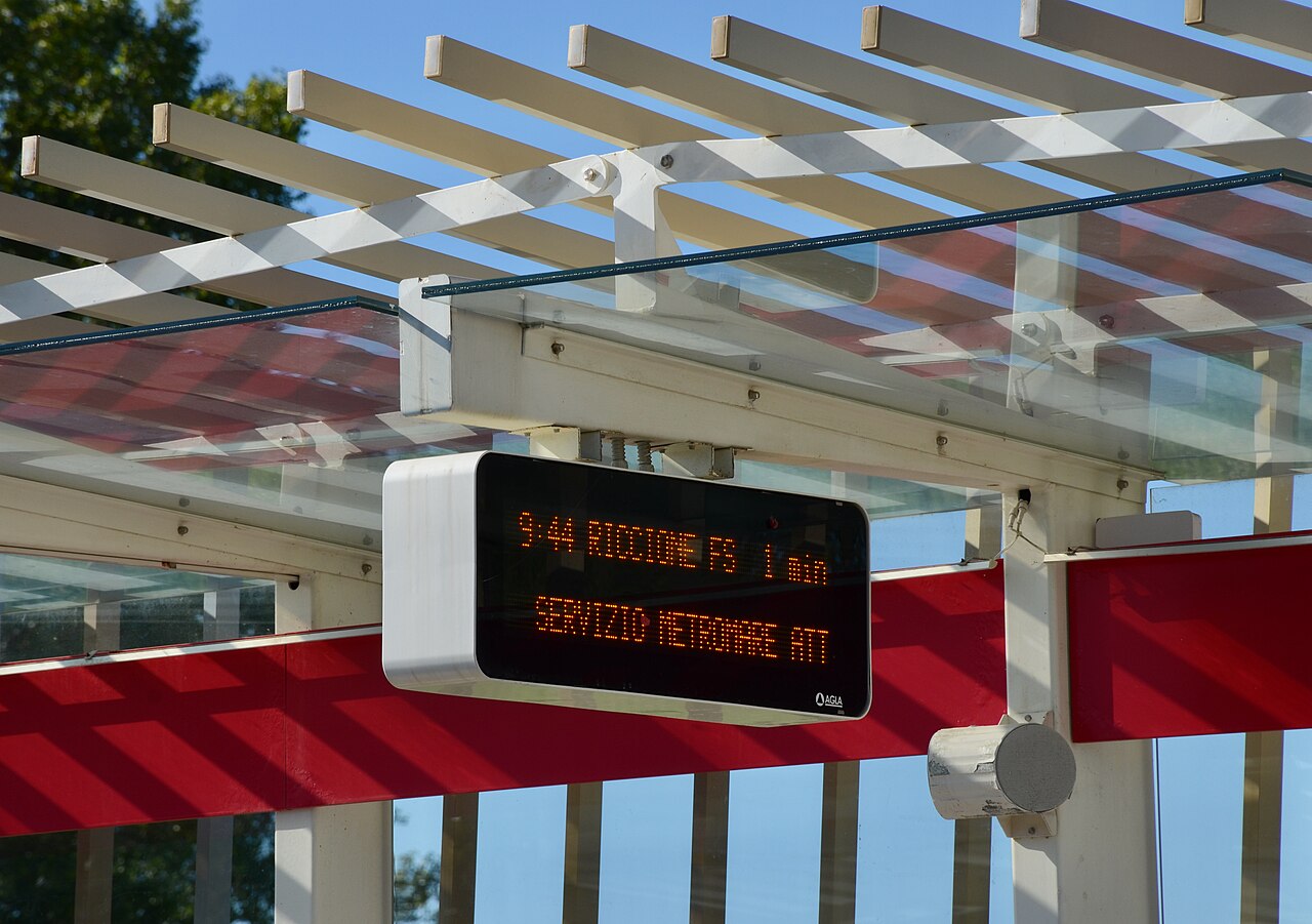 A real-time arrivals display at a Metromare trolleybus stop between Rimini and Riccione, Italy.